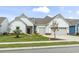 Charming two-story home with a two-car garage and well-manicured lawn at 7129 Spoleto Dr., Myrtle Beach, SC 29572