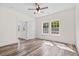 Living room featuring wood-look floors and ceiling fan at 1234 St. John Rd., Galivants Ferry, SC 29544