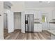 Bright kitchen with stainless steel refrigerator and pantry at 1234 St. John Rd., Galivants Ferry, SC 29544