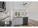 Open concept kitchen with island and living room with high ceilings at 1234 St. John Rd., Galivants Ferry, SC 29544