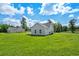 Aerial view showcasing a single Gathering home and neighboring house at 1174 St. John Rd., Galivants Ferry, SC 29544