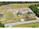 Aerial view of community homes under construction and surrounding land at 1174 St. John Rd., Galivants Ferry, SC 29544