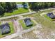Aerial view of three new homes and surrounding land at 1174 St. John Rd., Galivants Ferry, SC 29544