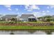 Lovely home with backyard, screened porch and water view at 6438 Cascata Dr., Myrtle Beach, SC 29572