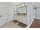 Double vanity bathroom with granite countertop and ample storage at 6438 Cascata Dr., Myrtle Beach, SC 29572
