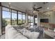 Bright and airy sunroom with plenty of natural light and comfortable furniture at 6438 Cascata Dr., Myrtle Beach, SC 29572