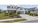 Nice gray house with a two-car garage and well-manicured landscaping at 6438 Cascata Dr., Myrtle Beach, SC 29572
