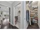 Convenient laundry room with washer, dryer, and storage shelves at 6438 Cascata Dr., Myrtle Beach, SC 29572