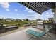 Outdoor patio with built-in grill and water view at 6438 Cascata Dr., Myrtle Beach, SC 29572