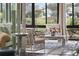 Relaxing sunroom with ample seating and views of backyard at 6438 Cascata Dr., Myrtle Beach, SC 29572