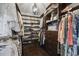 Large walk-in closet with custom shelving and hanging rods at 6438 Cascata Dr., Myrtle Beach, SC 29572