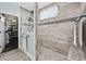 Large walk-in shower with built-in seat and glass enclosure at 6438 Cascata Dr., Myrtle Beach, SC 29572
