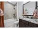 Bathroom boasts a shower/tub combo and granite countertop vanity at 6438 Cascata Dr., Myrtle Beach, SC 29572