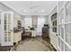 Home office with a workspace, arcade game, and built-in shelving at 6438 Cascata Dr., Myrtle Beach, SC 29572