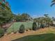 Community tennis court with surrounding landscape at 601 N Hillside Dr. # 2123, North Myrtle Beach, SC 29582