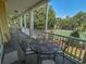 Private balcony with patio furniture and tennis court view at 601 N Hillside Dr. # 2123, North Myrtle Beach, SC 29582