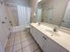 Bathroom with double vanity, bathtub, and shower at 601 N Hillside Dr. # 2123, North Myrtle Beach, SC 29582