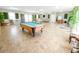 Community recreation room with pool table and seating area at 601 N Hillside Dr. # 2123, North Myrtle Beach, SC 29582