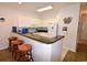 Well-equipped kitchen with granite countertops and breakfast bar at 601 N Hillside Dr. # 2123, North Myrtle Beach, SC 29582