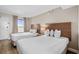 Bedroom with two double beds and ocean view at 1501 Ocean Blvd. S # 839, Myrtle Beach, SC 29577