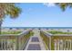 Wooden walkway to beach with ocean views at 1501 Ocean Blvd. S # 839, Myrtle Beach, SC 29577