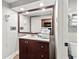 Bathroom with vanity, sink, and large mirror at 1501 Ocean Blvd. S # 839, Myrtle Beach, SC 29577