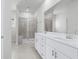 Modern bathroom with double vanity and walk-in shower at 623 Blackthorne Circle Nw, Calabash, NC 28467