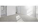 Bright bedroom with carpet flooring and an ensuite bathroom at 623 Blackthorne Circle Nw, Calabash, NC 28467