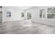 Bright dining area with sliding glass doors leading to the backyard at 623 Blackthorne Circle Nw, Calabash, NC 28467