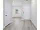Light and airy entryway with hardwood floors and access to living areas at 623 Blackthorne Circle Nw, Calabash, NC 28467