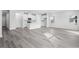 Open kitchen with white cabinets and a large island at 623 Blackthorne Circle Nw, Calabash, NC 28467