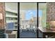 Balcony with ocean view, two chairs, and a small table at 1105 S Ocean Blvd. # 1138, Myrtle Beach, SC 29577