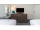 Hotel bedroom with two beds, dresser, and TV at 1105 S Ocean Blvd. # 1138, Myrtle Beach, SC 29577