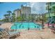 Refreshing outdoor pool with plenty of lounge chairs at 1105 S Ocean Blvd. # 1138, Myrtle Beach, SC 29577