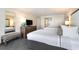Hotel bedroom with two beds, a dresser, and a mirror at 1105 S Ocean Blvd. # 1138, Myrtle Beach, SC 29577