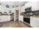 Modern kitchen with stainless steel appliances and ample cabinet space at 1886 Southwood Dr., Myrtle Beach, SC 29575