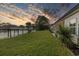 Spacious backyard with gazebo overlooking the water at sunset at 1886 Southwood Dr., Myrtle Beach, SC 29575
