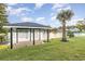 Waterfront gazebo with a wooden deck, ideal for relaxation at 1886 Southwood Dr., Myrtle Beach, SC 29575