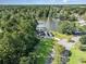 Aerial view of a house near a lake and surrounded by trees at 1886 Southwood Dr., Myrtle Beach, SC 29575
