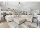 Spacious living room with large sectional sofa, hardwood floors, and an open floor plan at 1886 Southwood Dr., Myrtle Beach, SC 29575