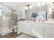 Elegant bathroom with double vanity, large mirror, and walk-in shower at 1886 Southwood Dr., Myrtle Beach, SC 29575