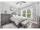 Bright bedroom with a queen-size bed and ample natural light at 1886 Southwood Dr., Myrtle Beach, SC 29575