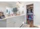Bathroom boasts double vanity, walk-in closet, and wood-look floors at 1886 Southwood Dr., Myrtle Beach, SC 29575