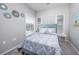 Bedroom with queen bed and window seating at 9772 Leyland Dr. # 9772-9, Myrtle Beach, SC 29572