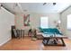 Living area with hardwood floors, a couch, and a coffee table at 7990 Short Needle Ct., Murrells Inlet, SC 29576