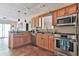 Kitchen boasts stainless steel appliances and ample wood cabinetry at 7990 Short Needle Ct., Murrells Inlet, SC 29576