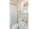 Simple bathroom with a shower and white vanity at 1000 Strand Ave., North Myrtle Beach, SC 29582