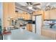 Kitchen features light wood cabinets and a breakfast bar at 1000 Strand Ave., North Myrtle Beach, SC 29582