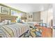 Guest bedroom with two twin beds, coastal decor, and wood floors at 202 74Th Ave. N # 1249/50, Myrtle Beach, SC 29572