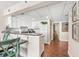 Kitchen with granite countertop, white cabinets, and breakfast bar at 202 74Th Ave. N # 1249/50, Myrtle Beach, SC 29572
